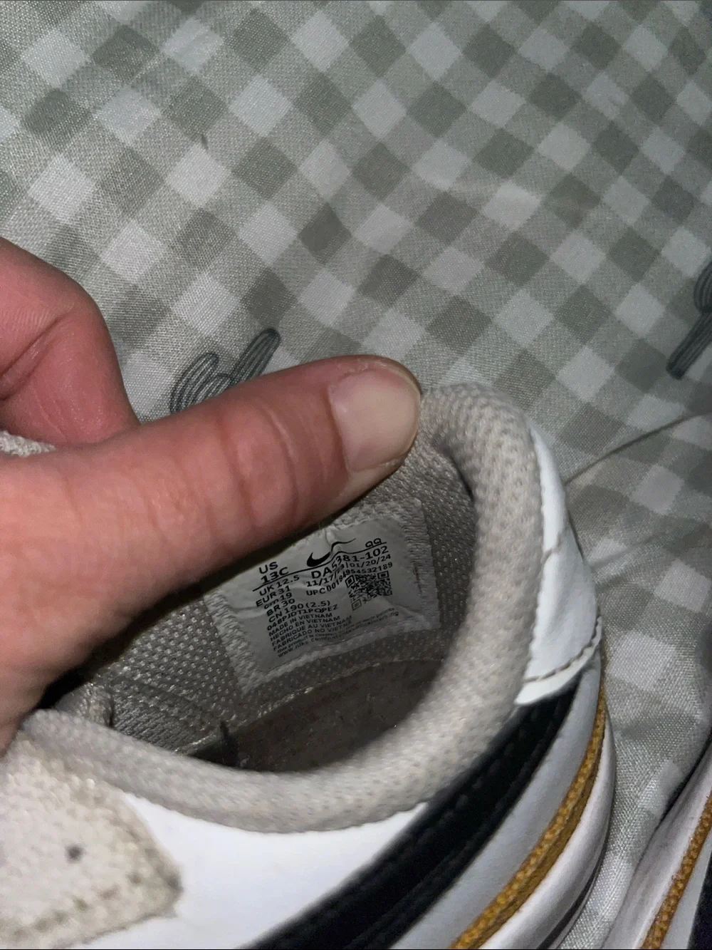Nike Kids White Low-Top Sneakers with Black Swoosh and Mustard Trim
